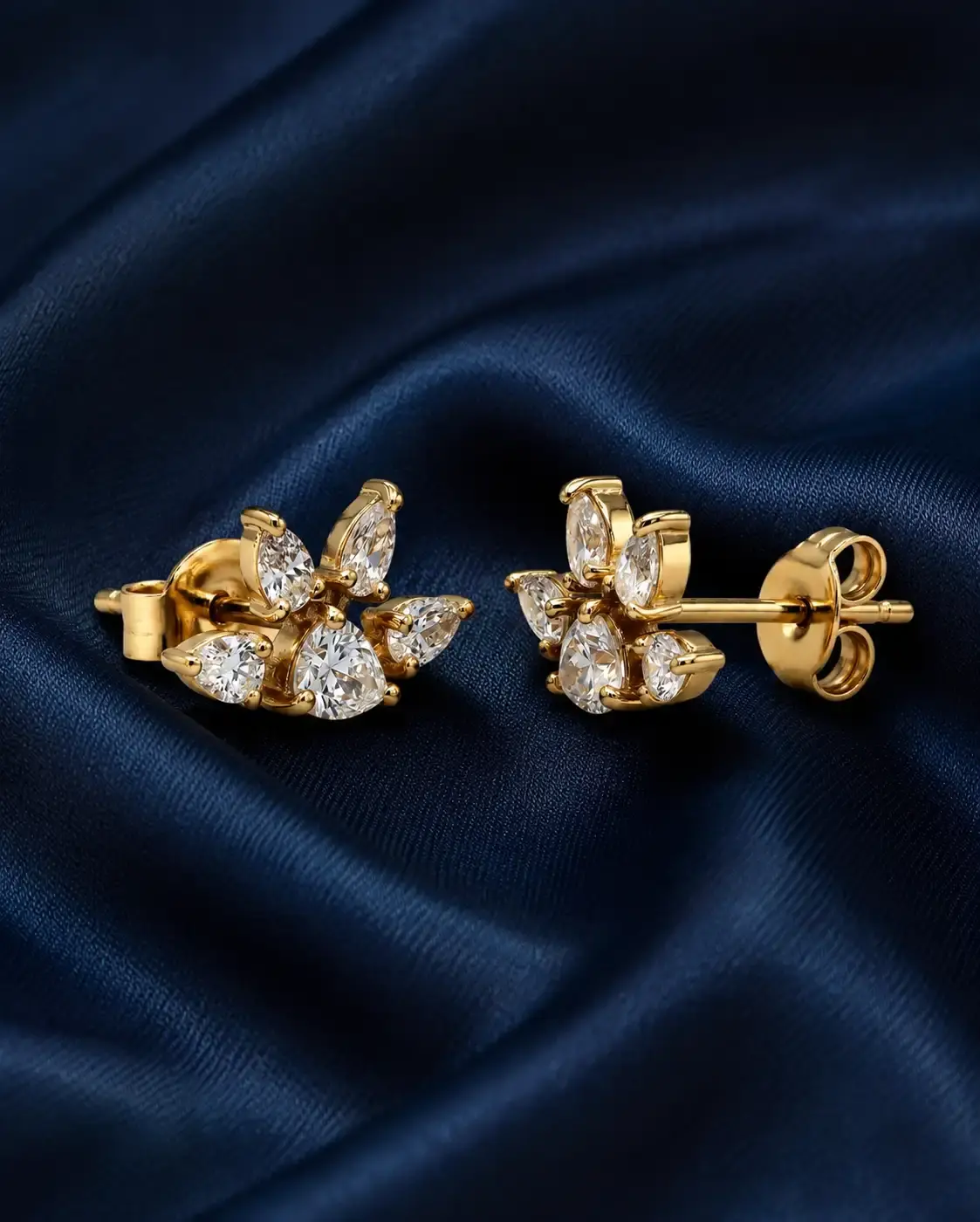 Küpeler